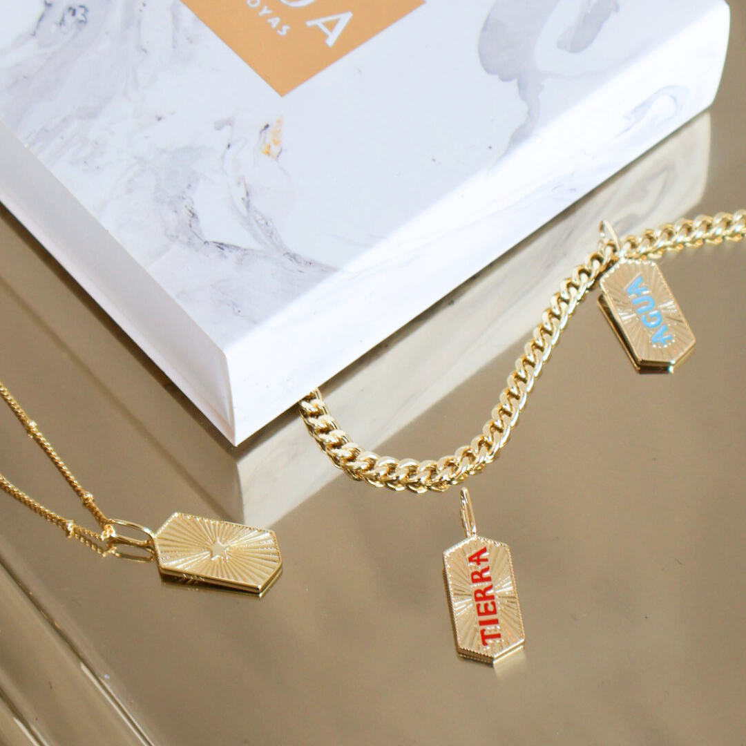 CHARM TIERRA BAÑO DE ORO