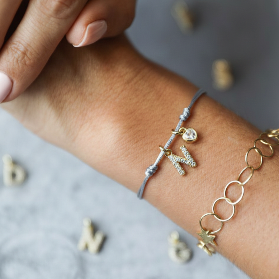 PULSERA ENCANTO HILO CELESTE BAÑO DE ORO