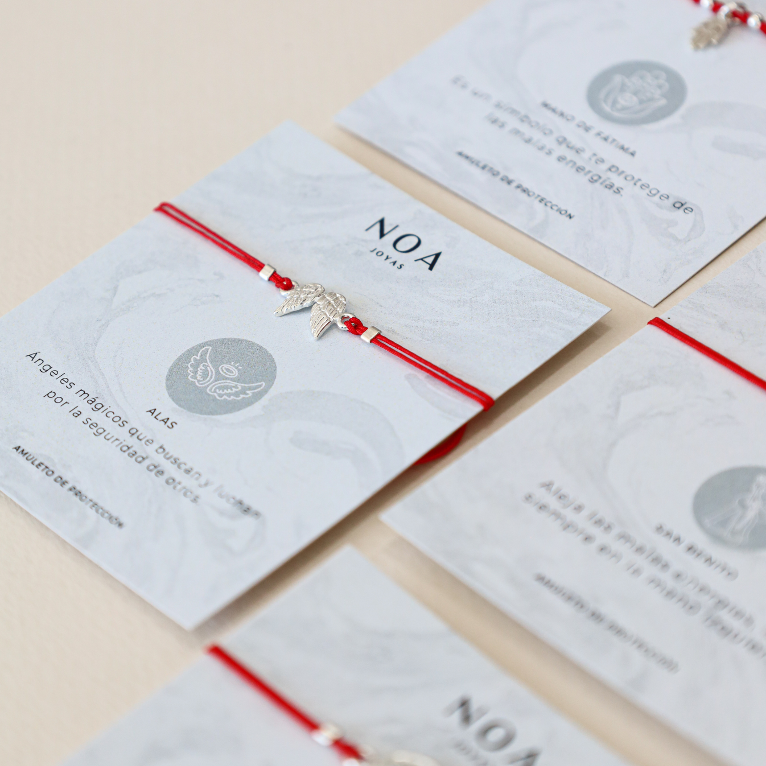 PULSERA HILO ROJO ALAS PLATA