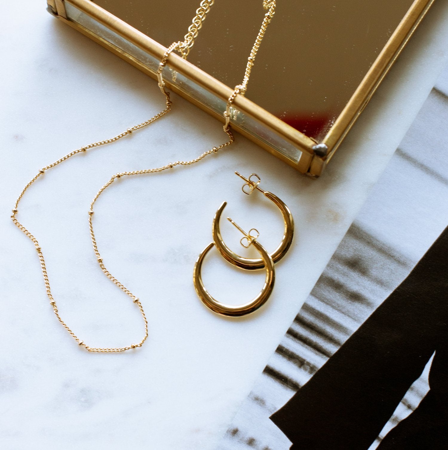 ARGOLLAS MONA BAÑO DE ORO